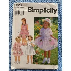 Simplicity 9523 pattern Girls dress flower pockets size 5 6 6x